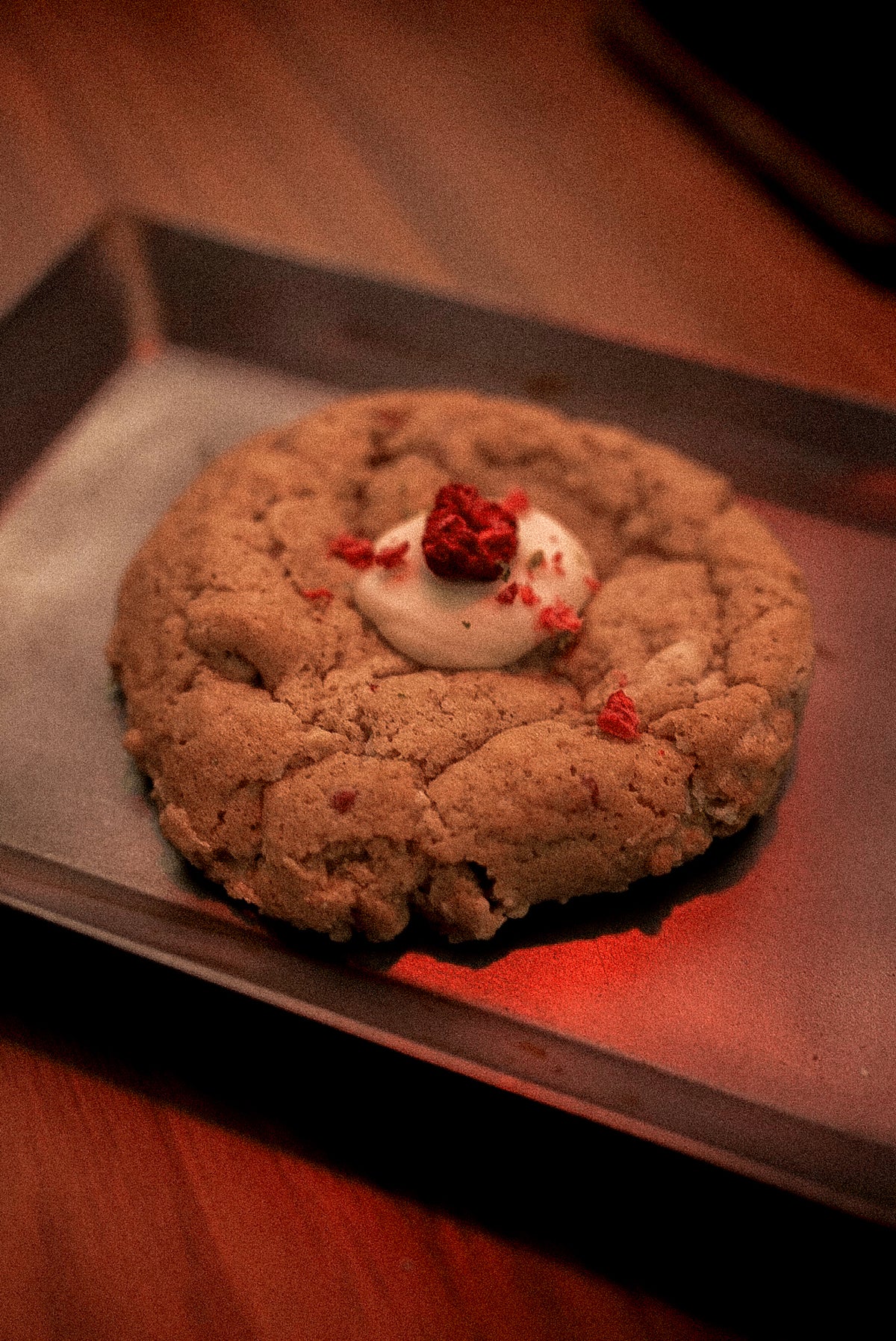 Gluten-free Kristi’s Cookies by GRAINED displayed on a plate with assorted cookies and a glass of milk.