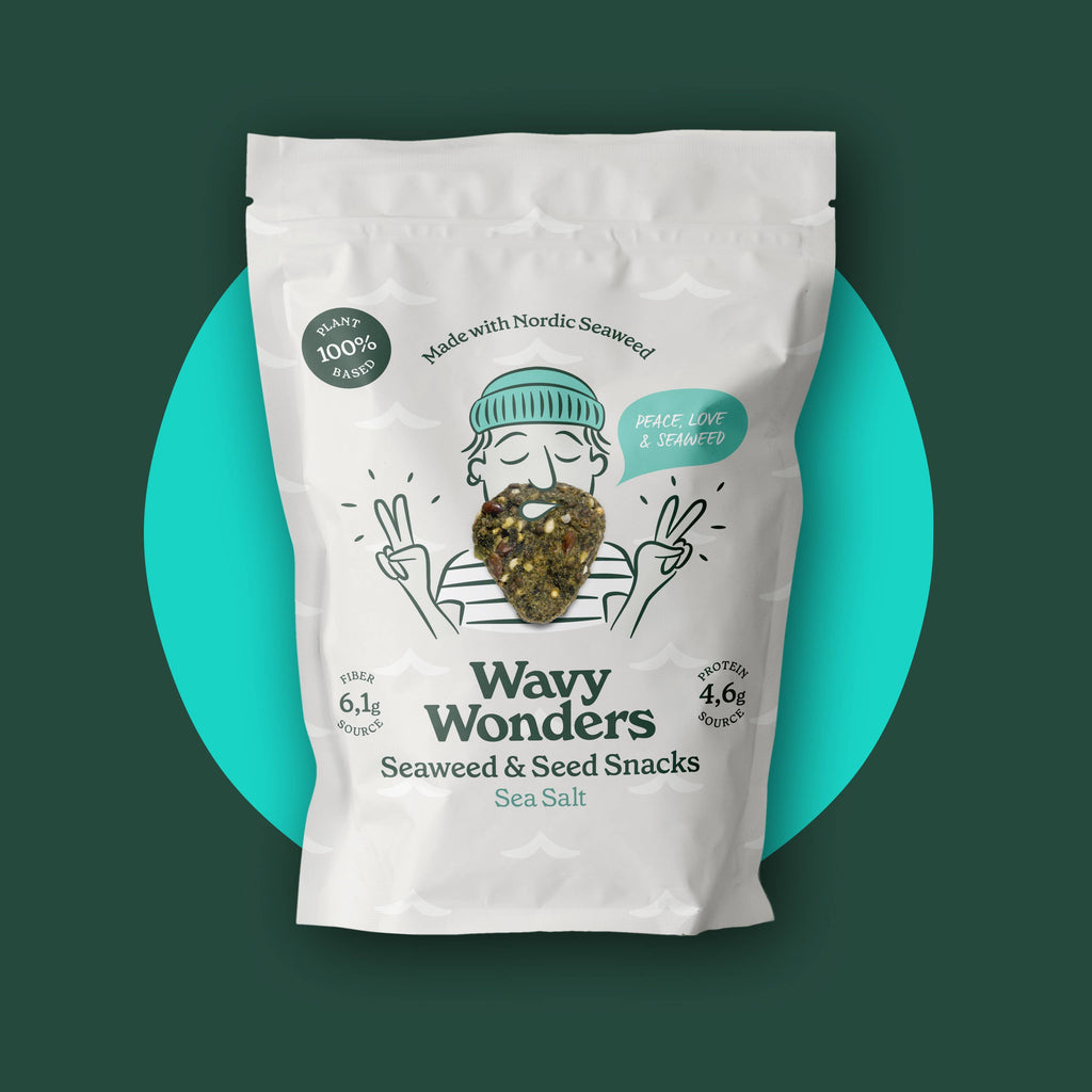 Wavy Wonders Seaweed & Seed Snacks with sea salt, featuring colorful seaweed and seed pieces in a clear snack package.
