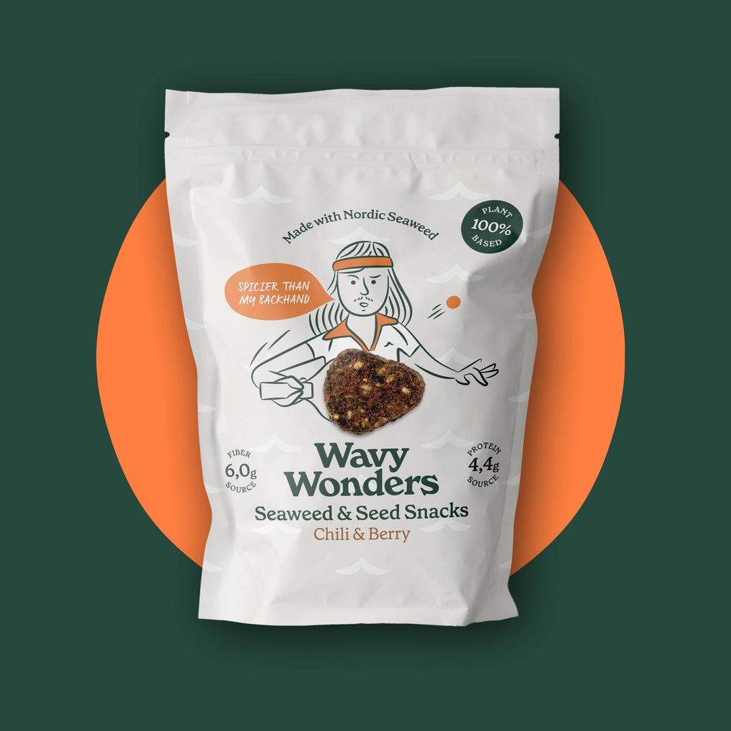 Wavy Wonders Seaweed & Seed Snacks in chili and berry flavor, showing crispy snack pieces with vibrant chili and berry colors.