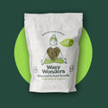 Wavy Wonders Seaweed and Seed Snacks with wild garlic and yoghurt flavor, showing crispy snack pieces in a clear bowl.