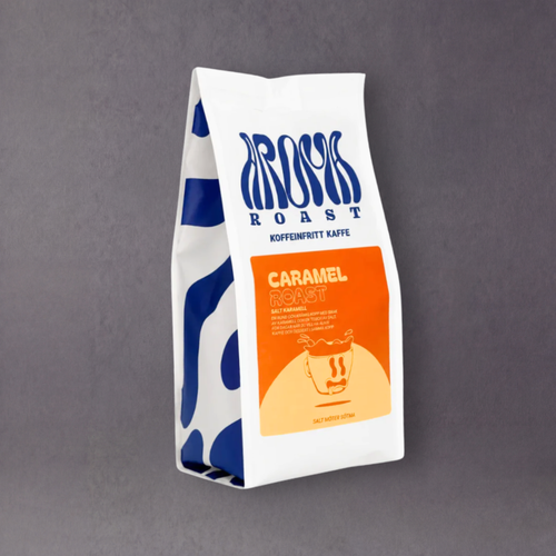 GRAINED Aroma Roast Decaf Coffee with salty caramel flavor, three roast varieties displayed in the image.