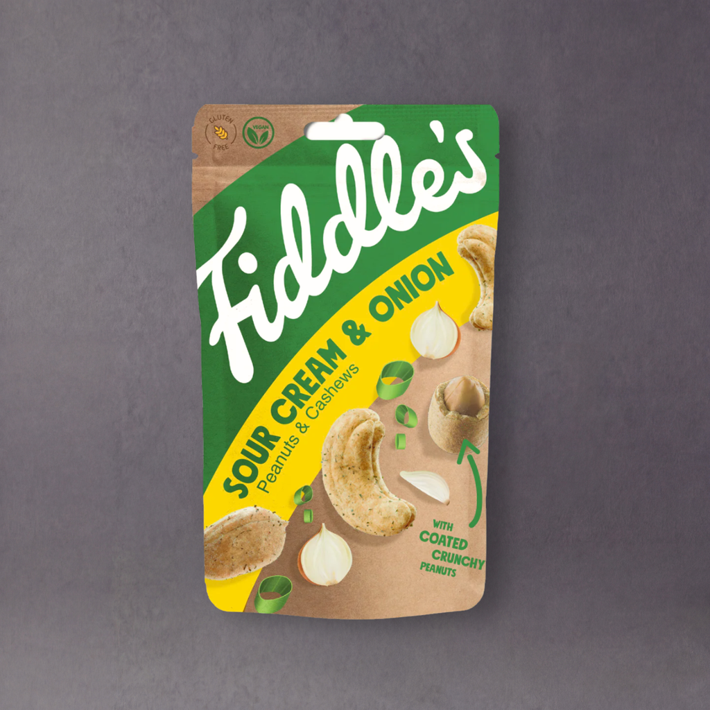 Fiddle’s Snacks trail mix featuring mixed nuts, dried fruits, and granola in a colorful bag for healthy snacking.