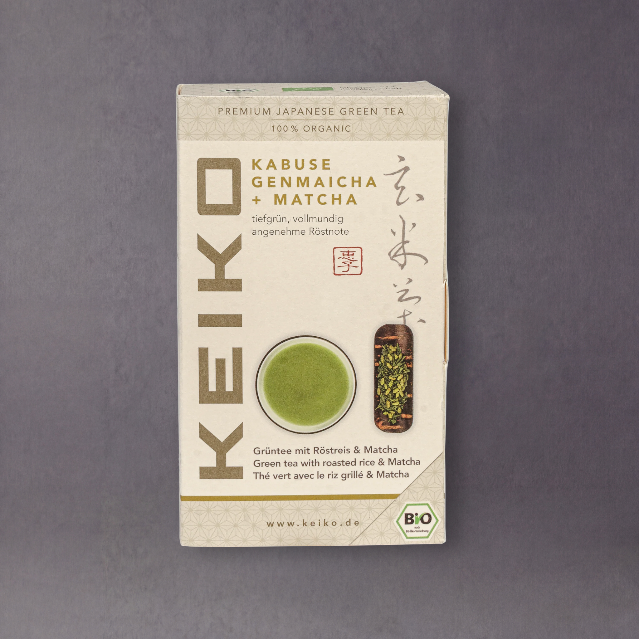 Organic Keiko Genmaicha and Matcha tea blend in a package, featuring green tea leaves, roasted rice, and vibrant green matcha powder.