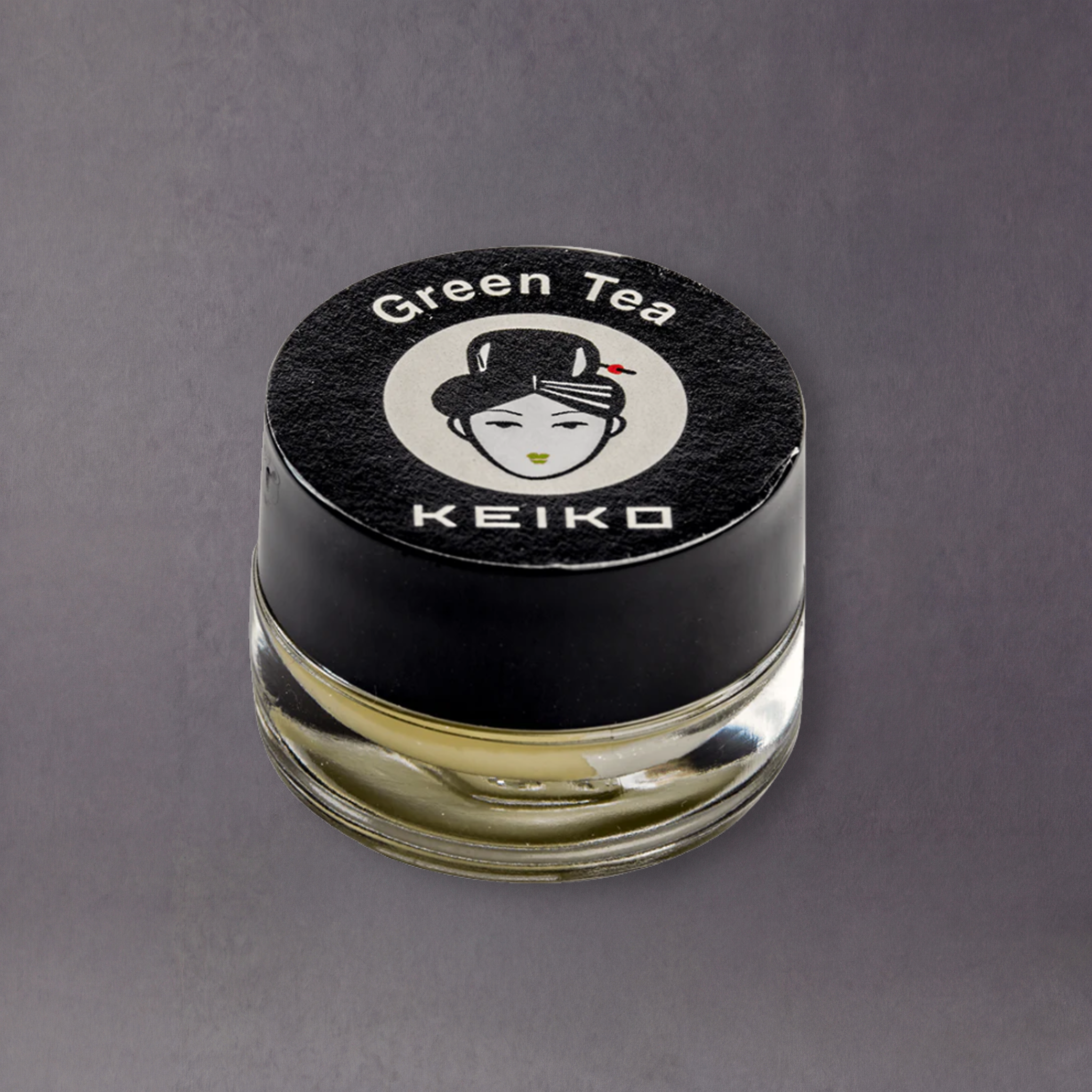 Keiko Organic Matcha Lip Balm showing the small jar with green tea matcha-infused balm and natural packaging.