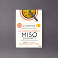 GRAINED CO. Clearspring Miso Paste with ginger and turmeric in a jar, showcasing the fermented miso paste for soups and cooking.