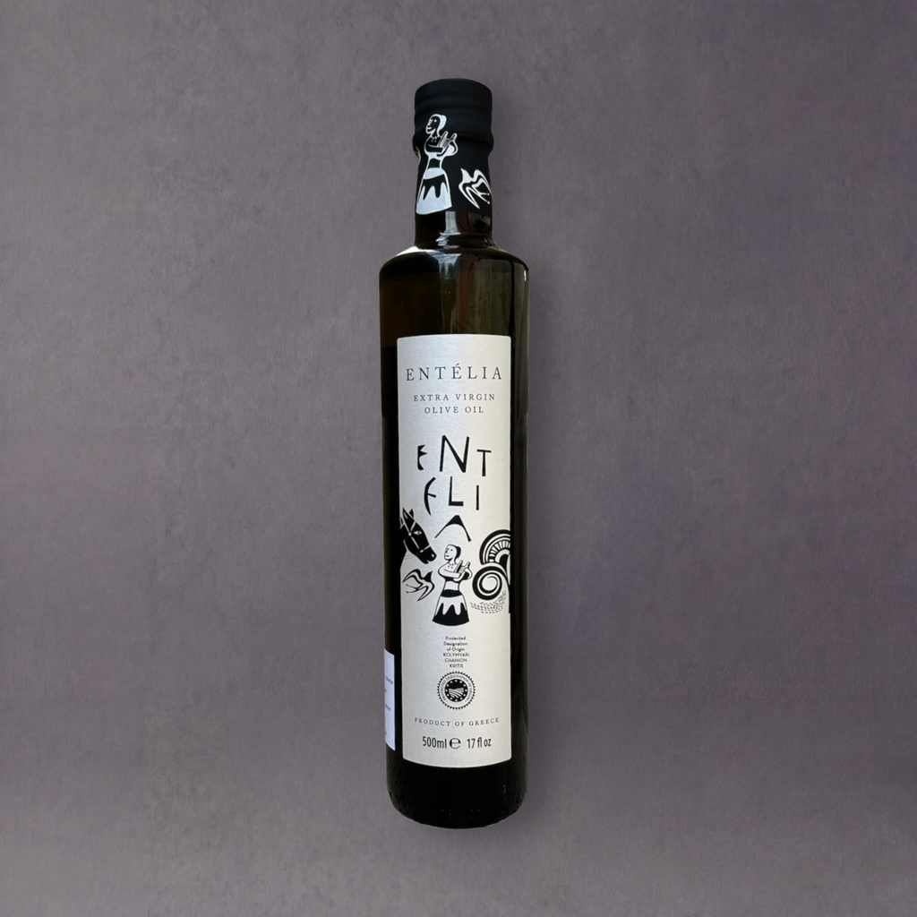 Entèlia Kreta extra virgin olive oil bottle from GRAINED, 500ml, showcasing the dark glass bottle and label with Greek olive imagery.