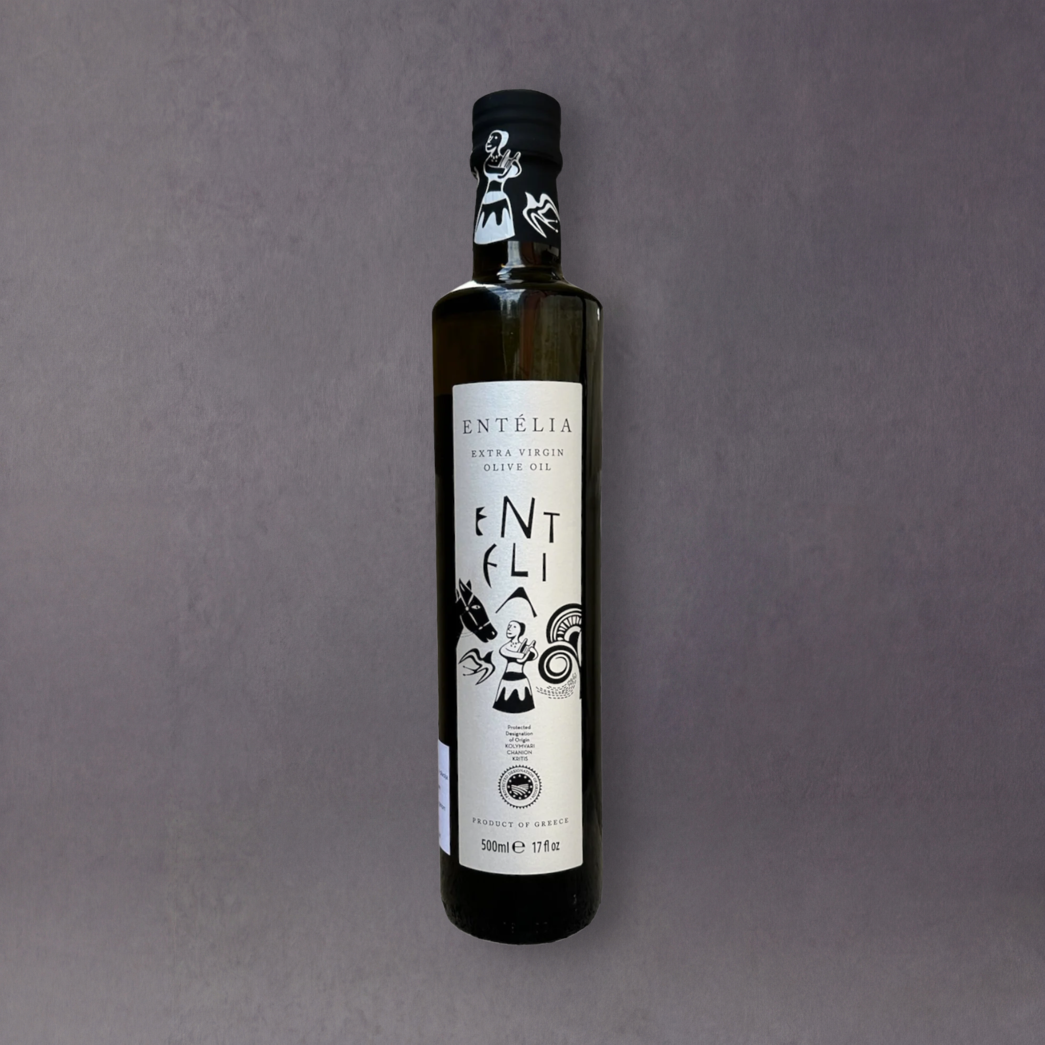 Entèlia Kreta extra virgin olive oil bottle from GRAINED, 500ml, showcasing the dark glass bottle and label with Greek olive imagery.