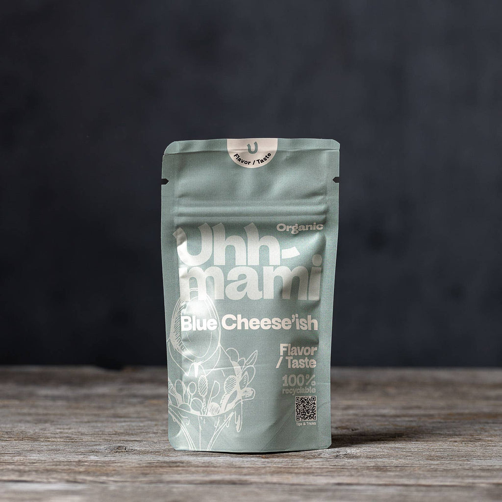 Uhhmami Blue Cheese'ish 40g, creamy blue cheese spread in a small jar with a blue-tinted label and cheese crumbles.