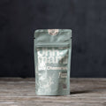 Uhhmami Blue Cheese'ish 40g, creamy blue cheese spread in a small jar with a blue-tinted label and cheese crumbles.
